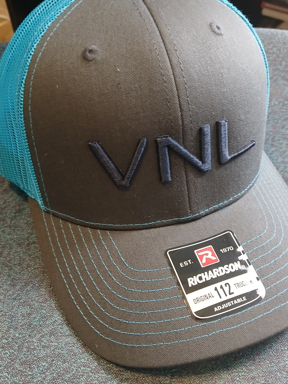Volvo VNL Embroidered Trucker Hat in Teal and Gray by Richardson